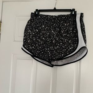 Black and white Nike running shorts